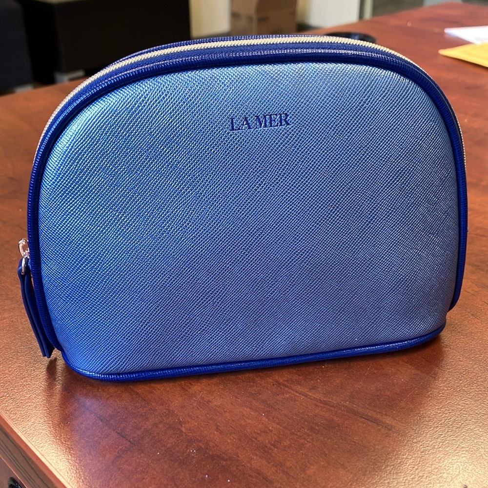 Brand new La Mer Blue Metallic Cometic Pouch